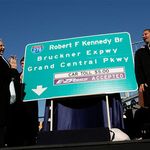 Unveiling a new sign for the Robert F. Kennedy Bridge.